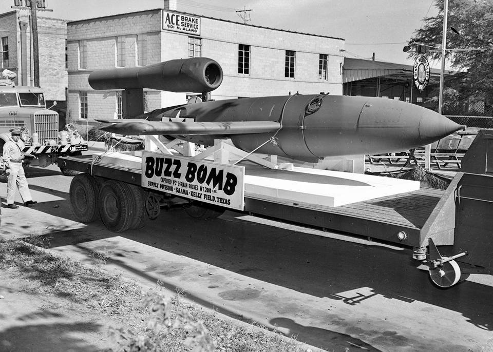 The 1946 Armistice Day parade with the captured V-2 Buzz Bomb in front of 901 N. Alamo